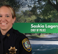 Saskia Lagergren Chief of Police Woman in police uniform behind her a street filled with trees